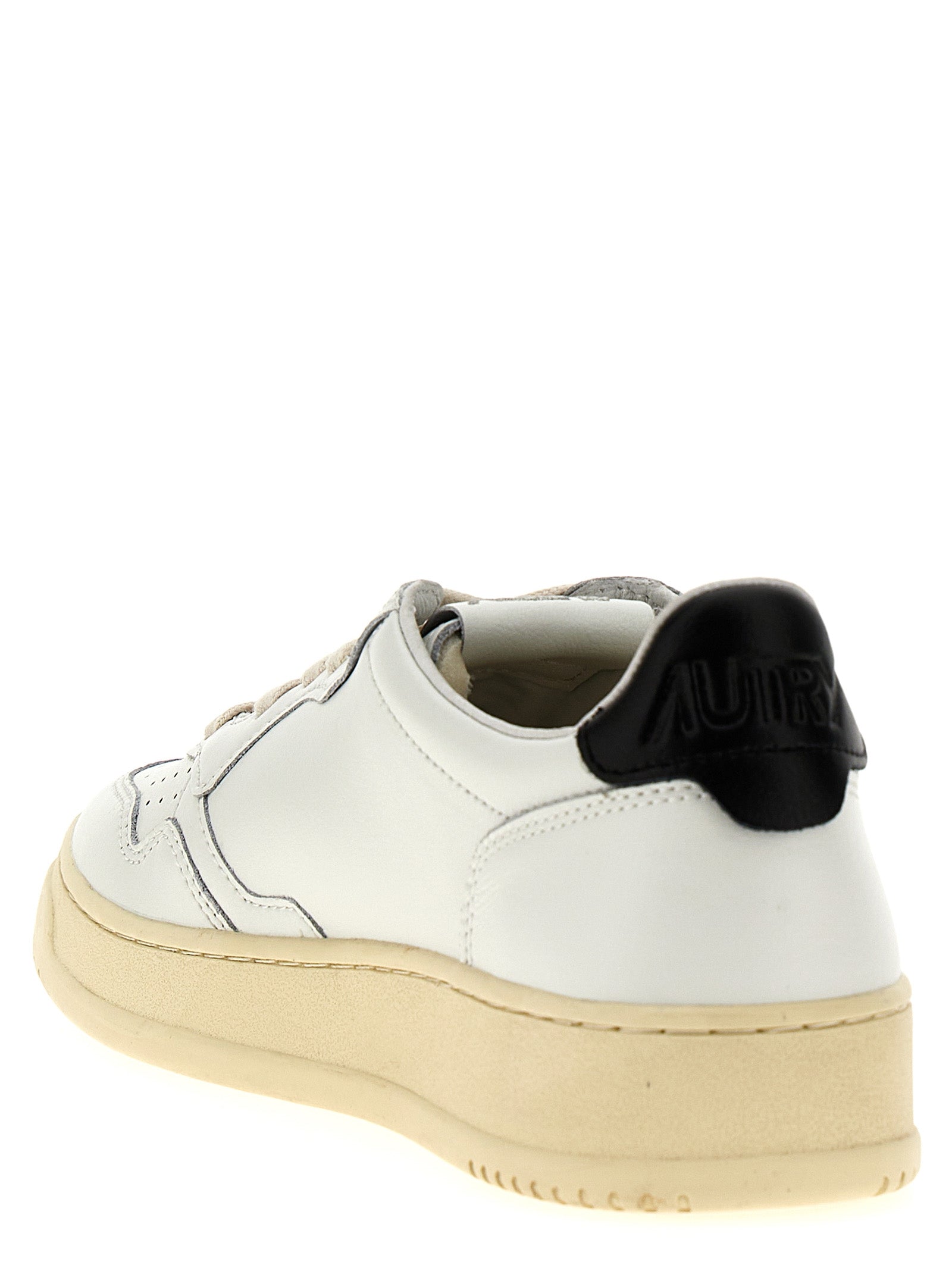 Autry Bicolor Calfskin Low Top Sneakers Curated Luxury Accessories by Orvyn