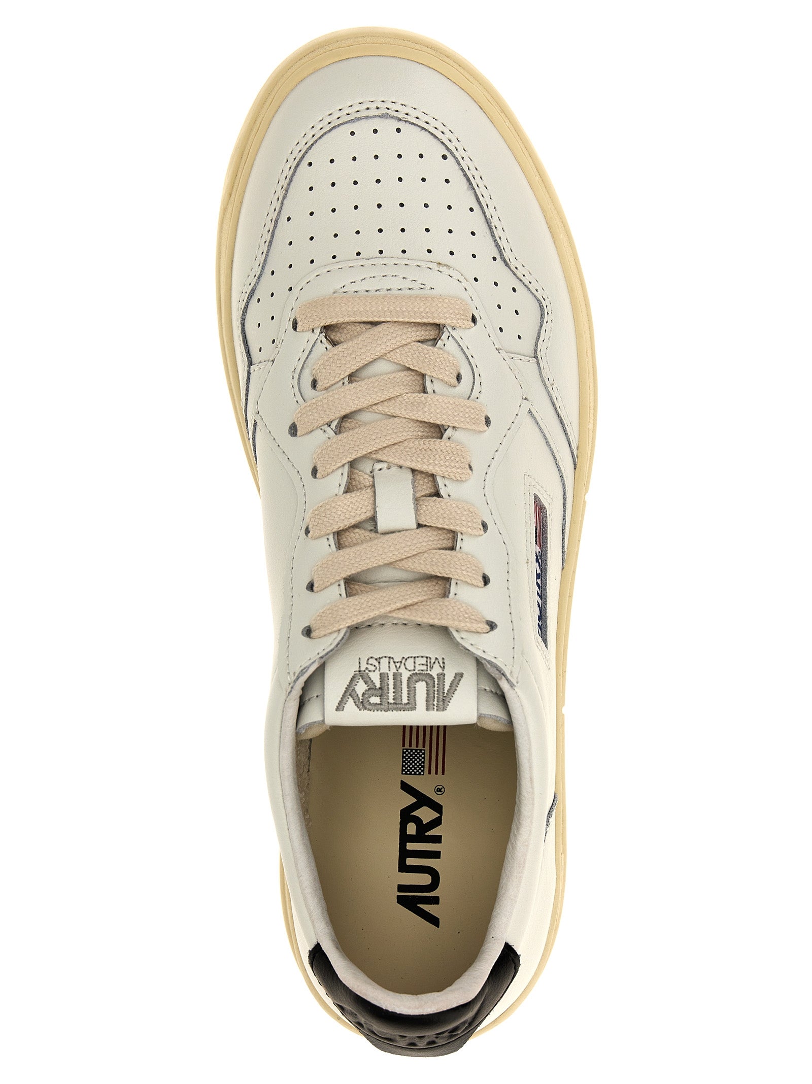 Autry Bicolor Calfskin Low Top Sneakers Curated Luxury Accessories by Orvyn