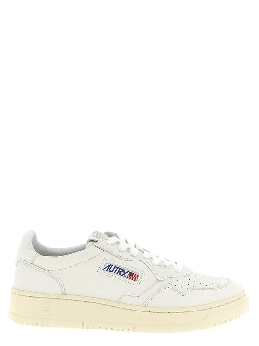 Autry White Goatskin Medalist Low Sneakers Curated Luxury Accessories by Orvyn