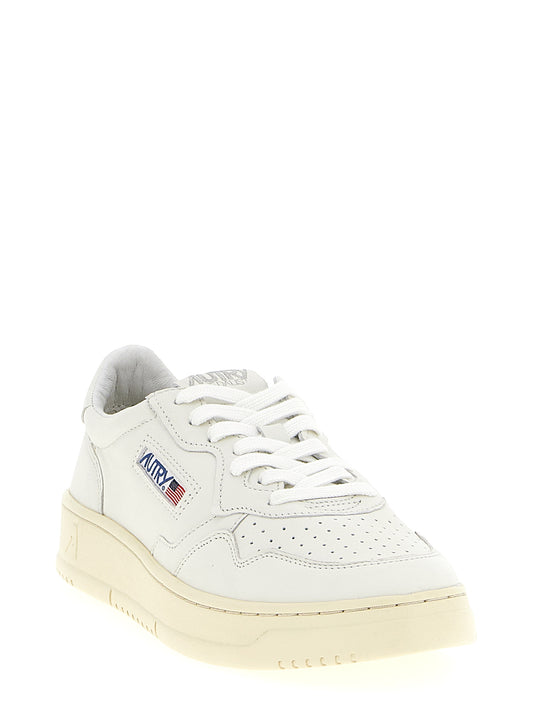 Autry White Goatskin Medalist Low Sneakers Curated Luxury Accessories by Orvyn