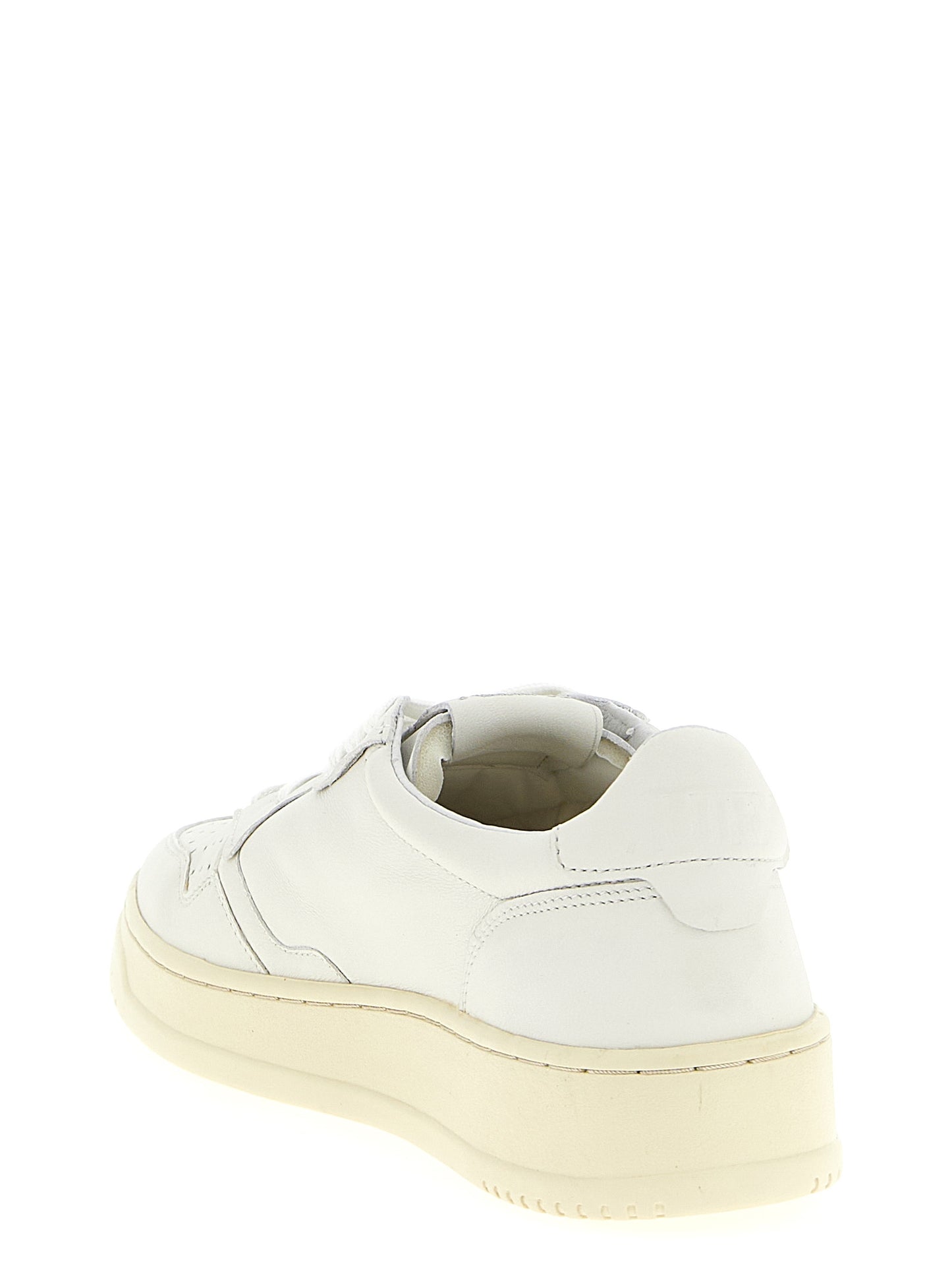 Autry White Goatskin Medalist Low Sneakers Curated Luxury Accessories by Orvyn