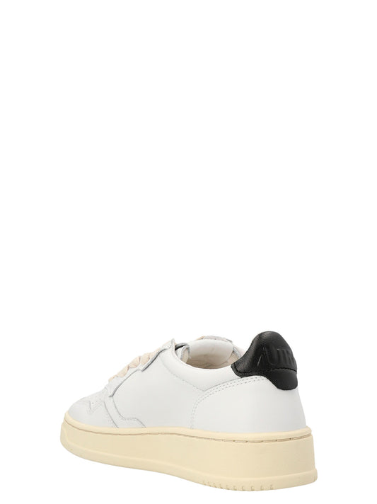 Autry Bicolor Cowhide Low Top Sneakers Curated Luxury Accessories by Orvyn