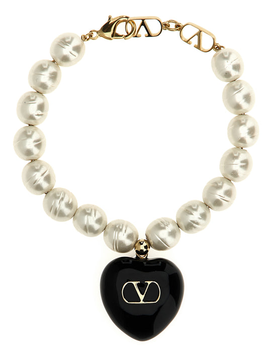 Valentino Garavani Black Brass Bracelet Curated Luxury Accessories by Orvyn