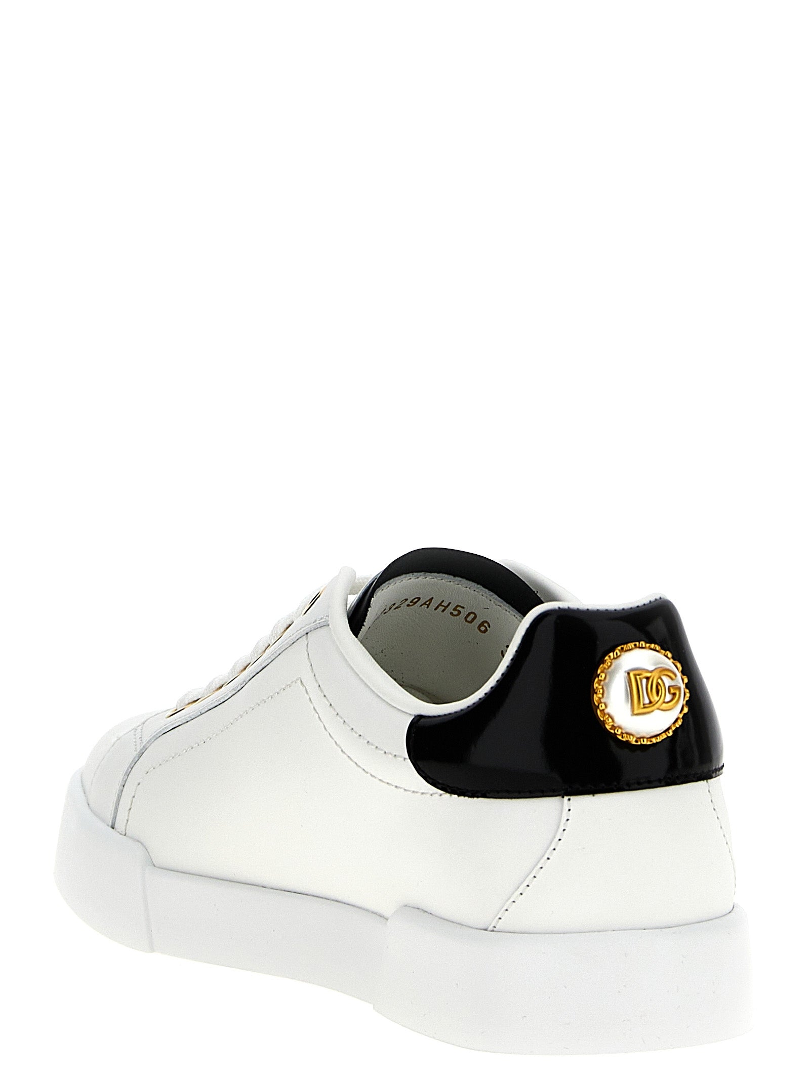 Dolce & Gabbana Bicolor Calfskin Low Top Sneakers Curated Luxury Accessories by Orvyn