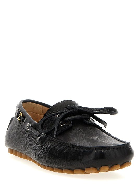 Valentino Garavani Black Buffalo Leather Slip-On Loafers Curated Luxury Accessories by Orvyn