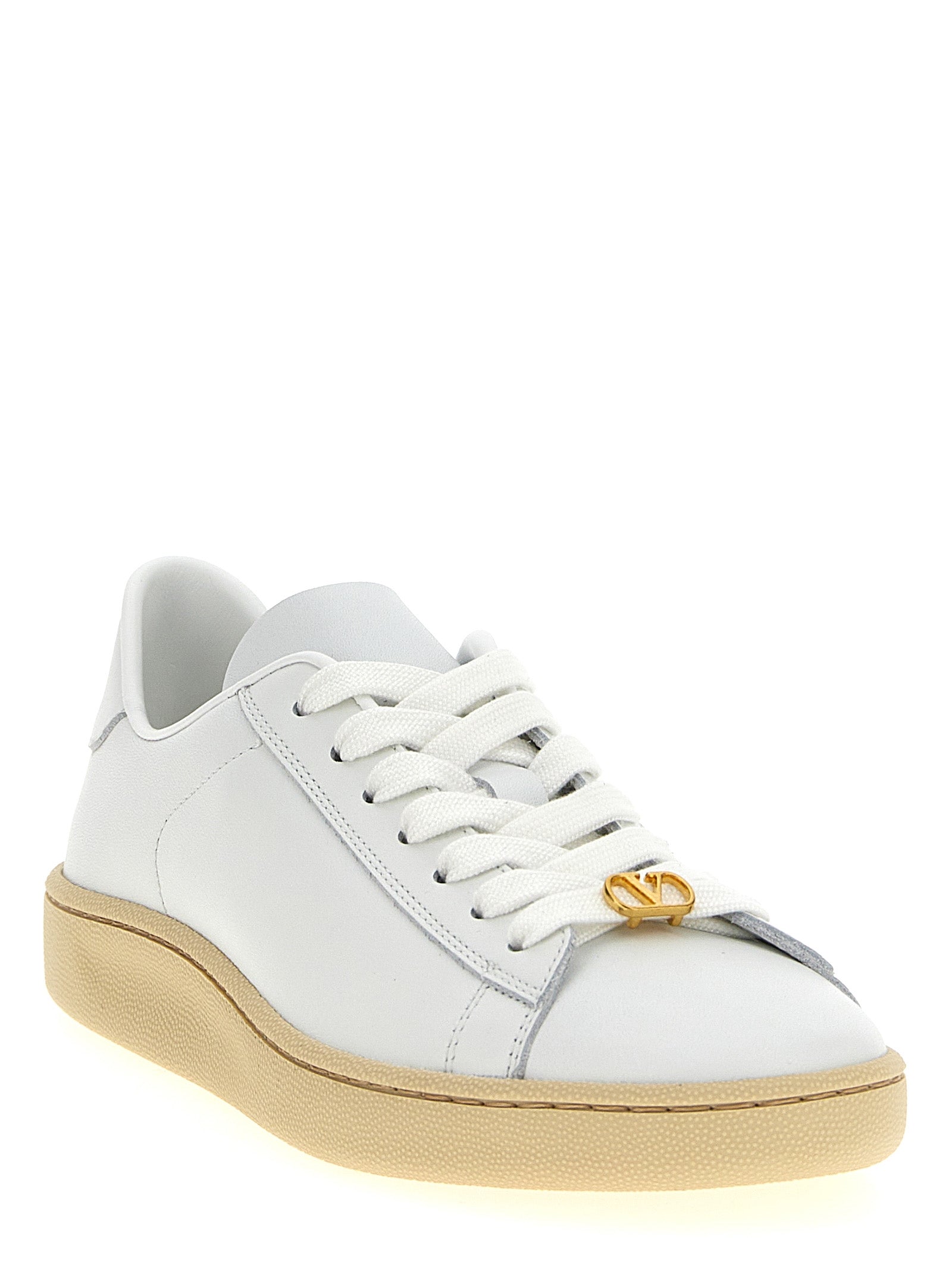 Valentino Garavani White Calfskin Low Top Sneakers Curated Luxury Accessories by Orvyn
