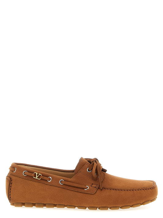 Valentino Garavani Brown Calfskin Slip-On Loafers Curated Luxury Accessories by Orvyn