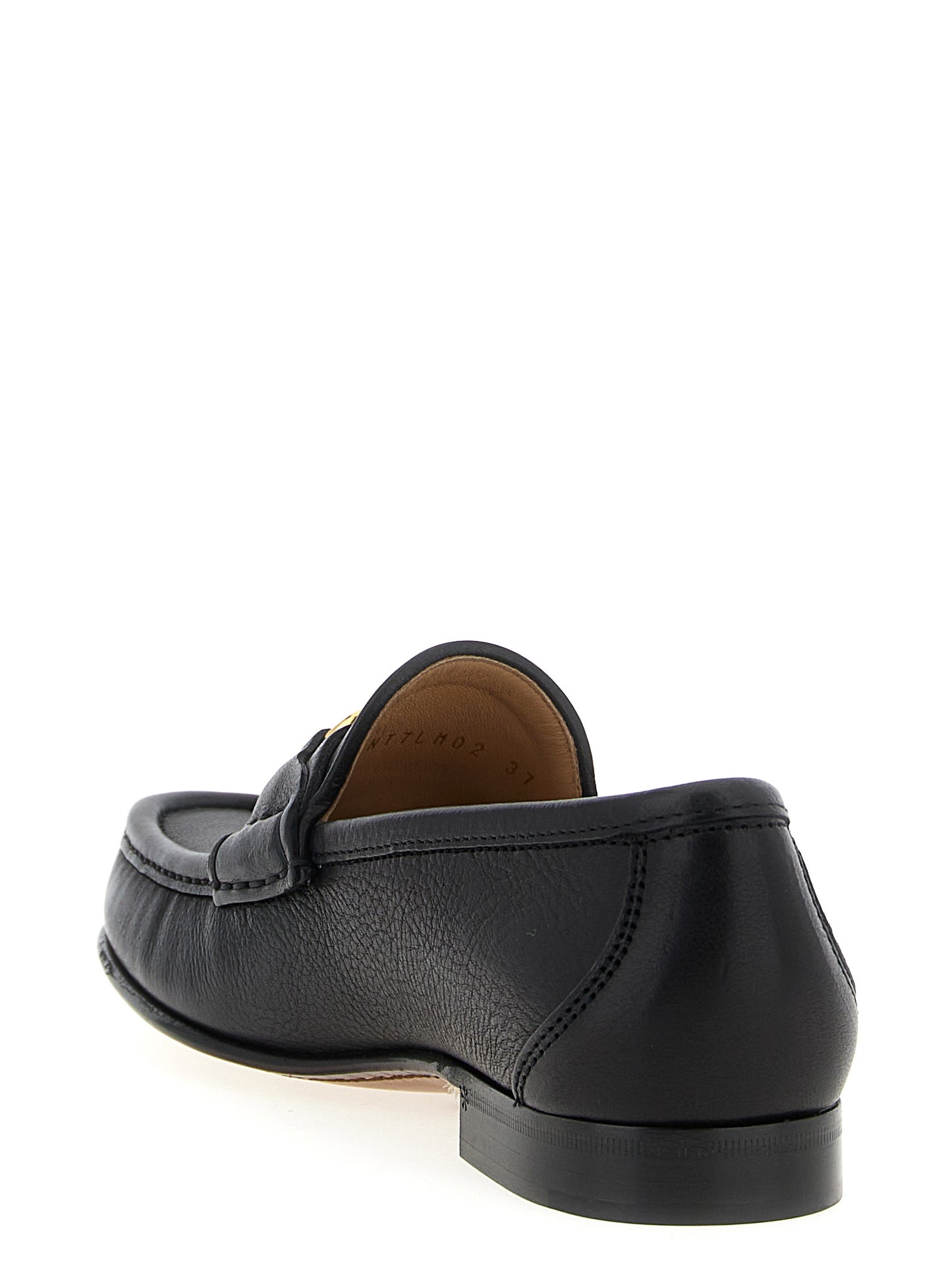 Valentino Garavani Black Buffalo Leather Slip-On Loafers Curated Luxury Accessories by Orvyn
