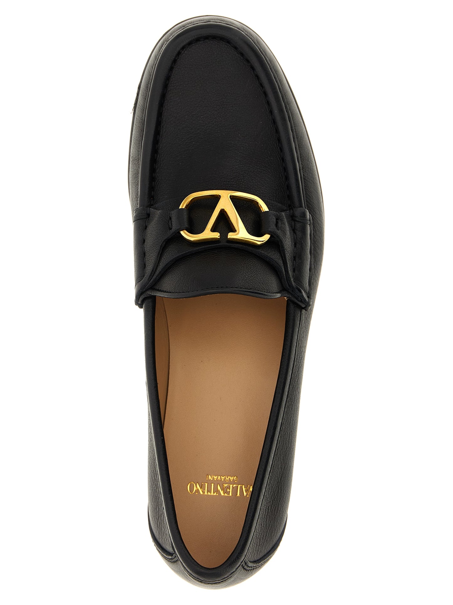 Valentino Garavani Black Buffalo Leather Slip-On Loafers Curated Luxury Accessories by Orvyn