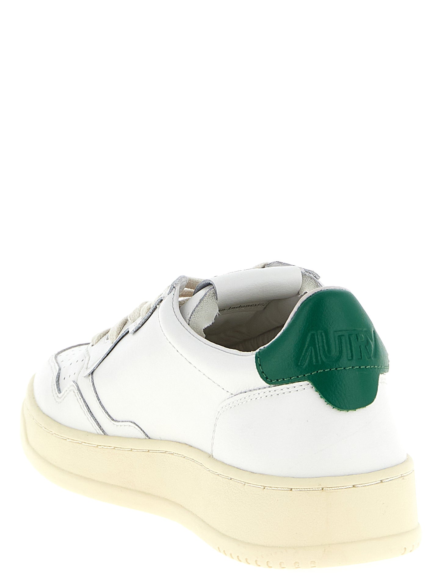 Autry Bicolor Goatskin Low Top Sneakers Curated Luxury Accessories by Orvyn