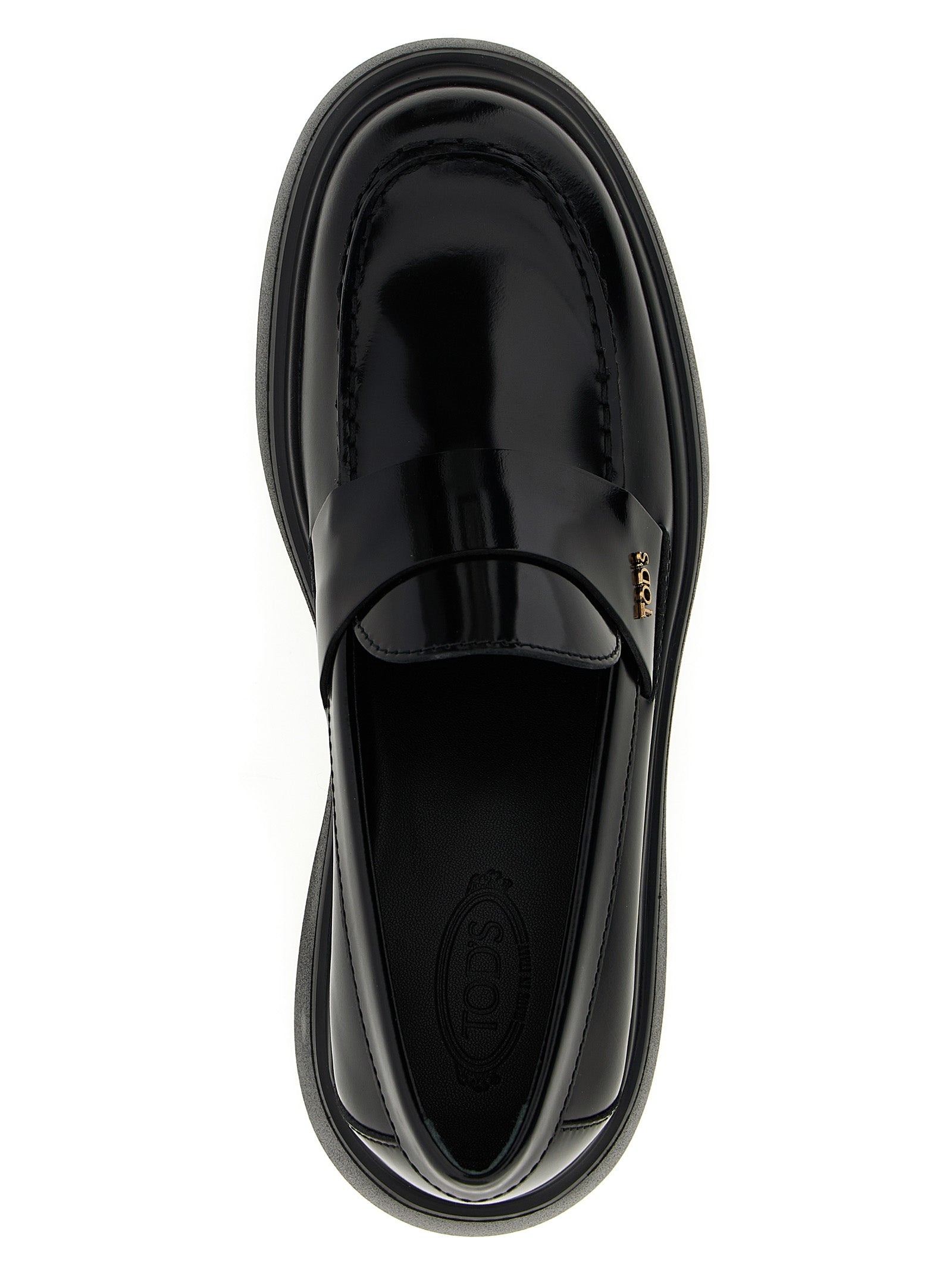 Tod's Black Calfskin Slip-On Loafers Curated Luxury Accessories by Orvyn