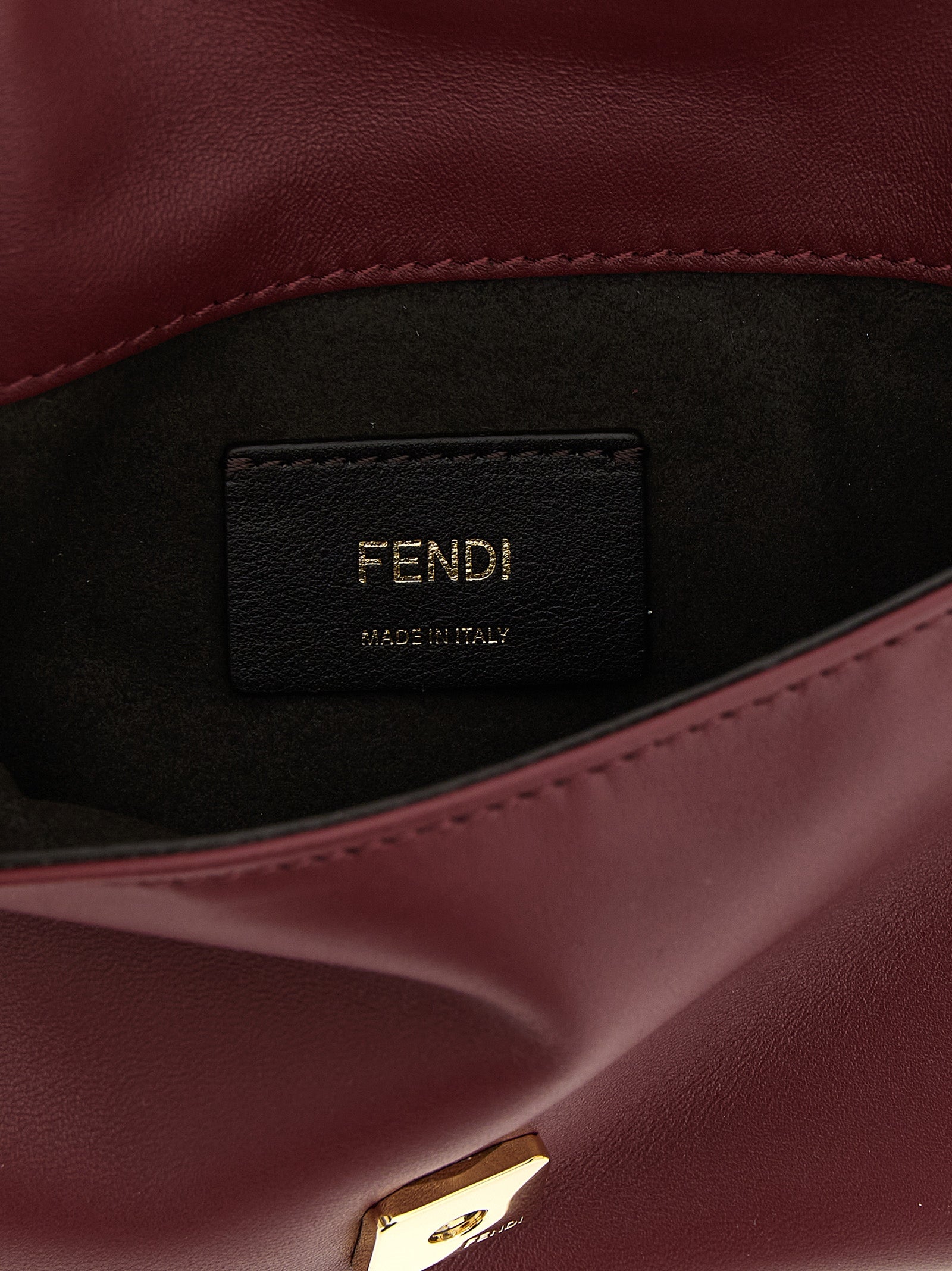 Fendi Bordeaux Lamb Leather Clutch Bag Curated Luxury Accessories by Orvyn
