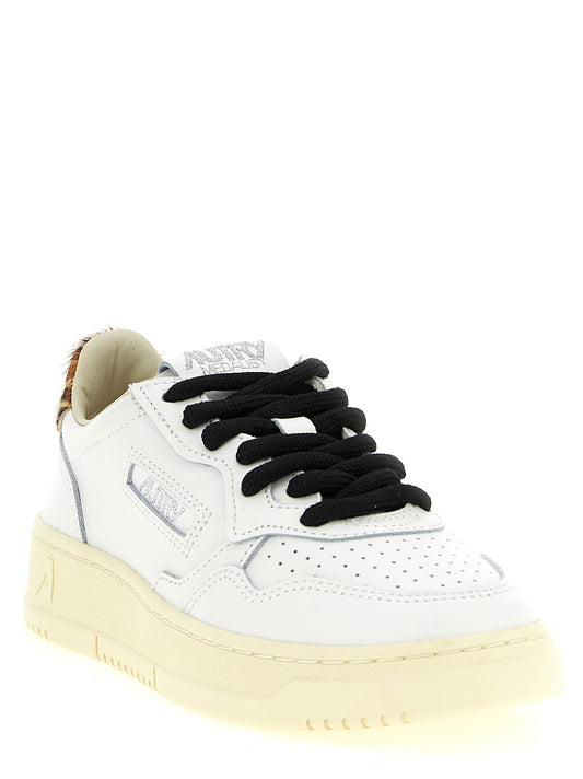 Autry Brown Cowhide Low Top Sneakers Curated Luxury Accessories by Orvyn