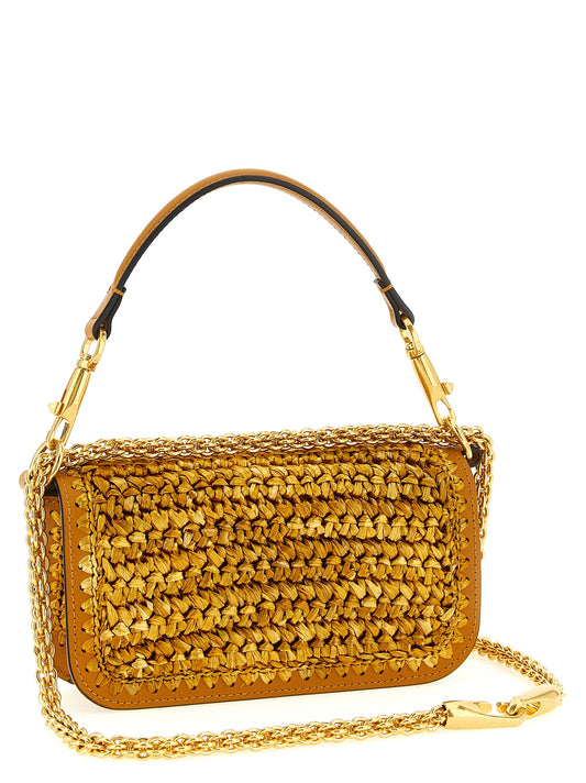 Valentino Garavani Gold 'Locò' Small Shoulder Bag Curated Luxury Accessories by Orvyn