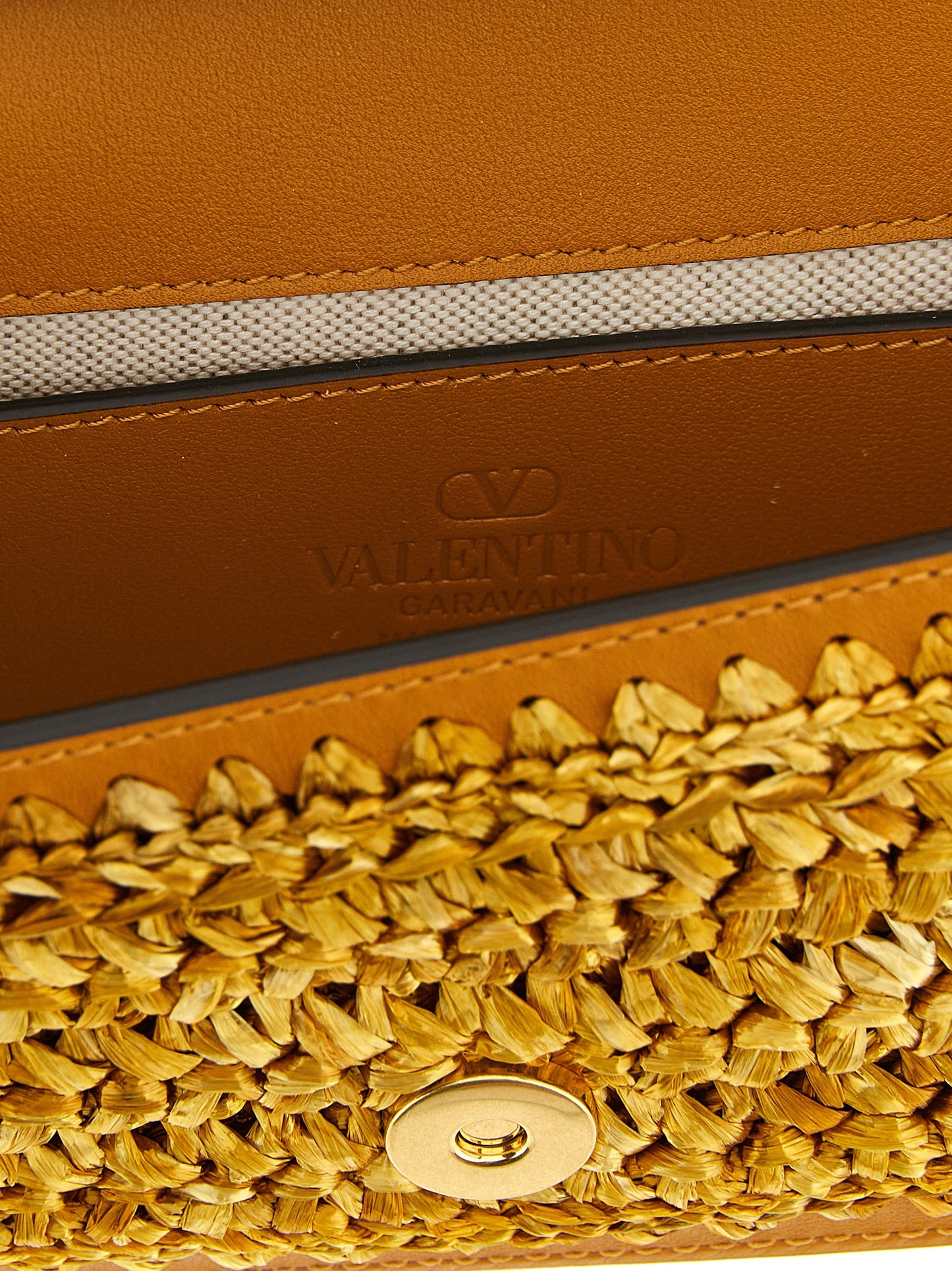 Valentino Garavani Gold 'Locò' Small Shoulder Bag Curated Luxury Accessories by Orvyn