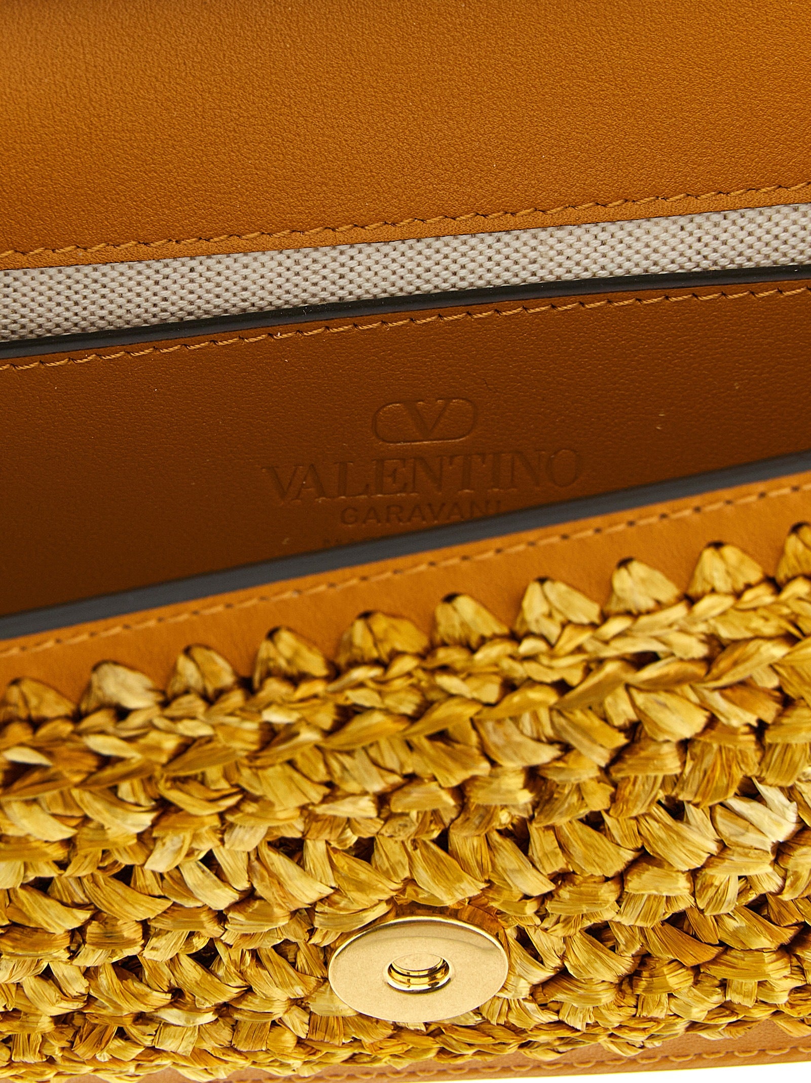 Valentino Garavani Gold 'Locò' Small Shoulder Bag Curated Luxury Accessories by Orvyn