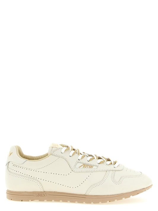 Autry Beige Cowhide Low Top Sneakers Curated Luxury Accessories by Orvyn