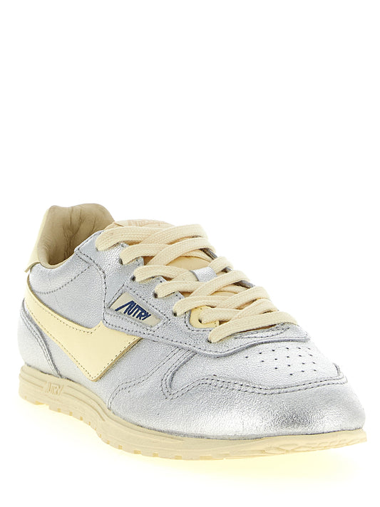 Autry Silver Cowhide Low Top Sneakers Curated Luxury Accessories by Orvyn