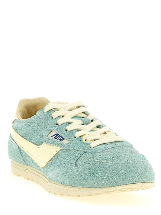 Autry Blue Cowhide Low Top Sneakers Curated Luxury Accessories by Orvyn