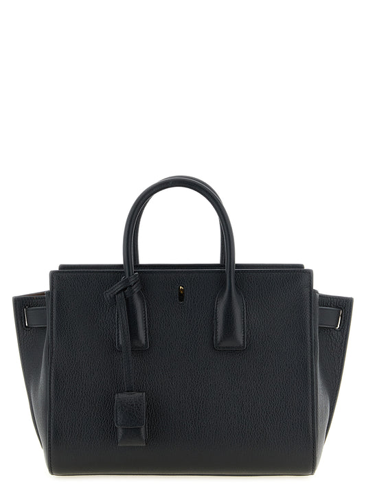 Saint Laurent Black 'Cassandre' Handbag Curated Luxury Accessories by Orvyn