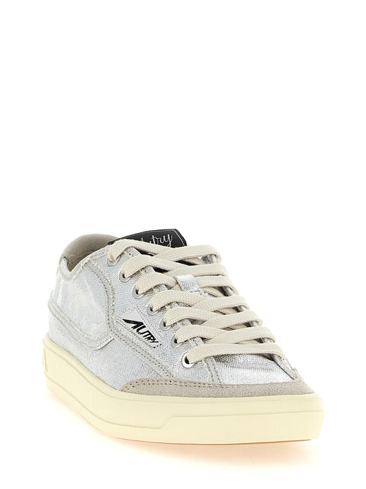 Autry Silver Canvas Low Top Sneakers Curated Luxury Accessories by Orvyn