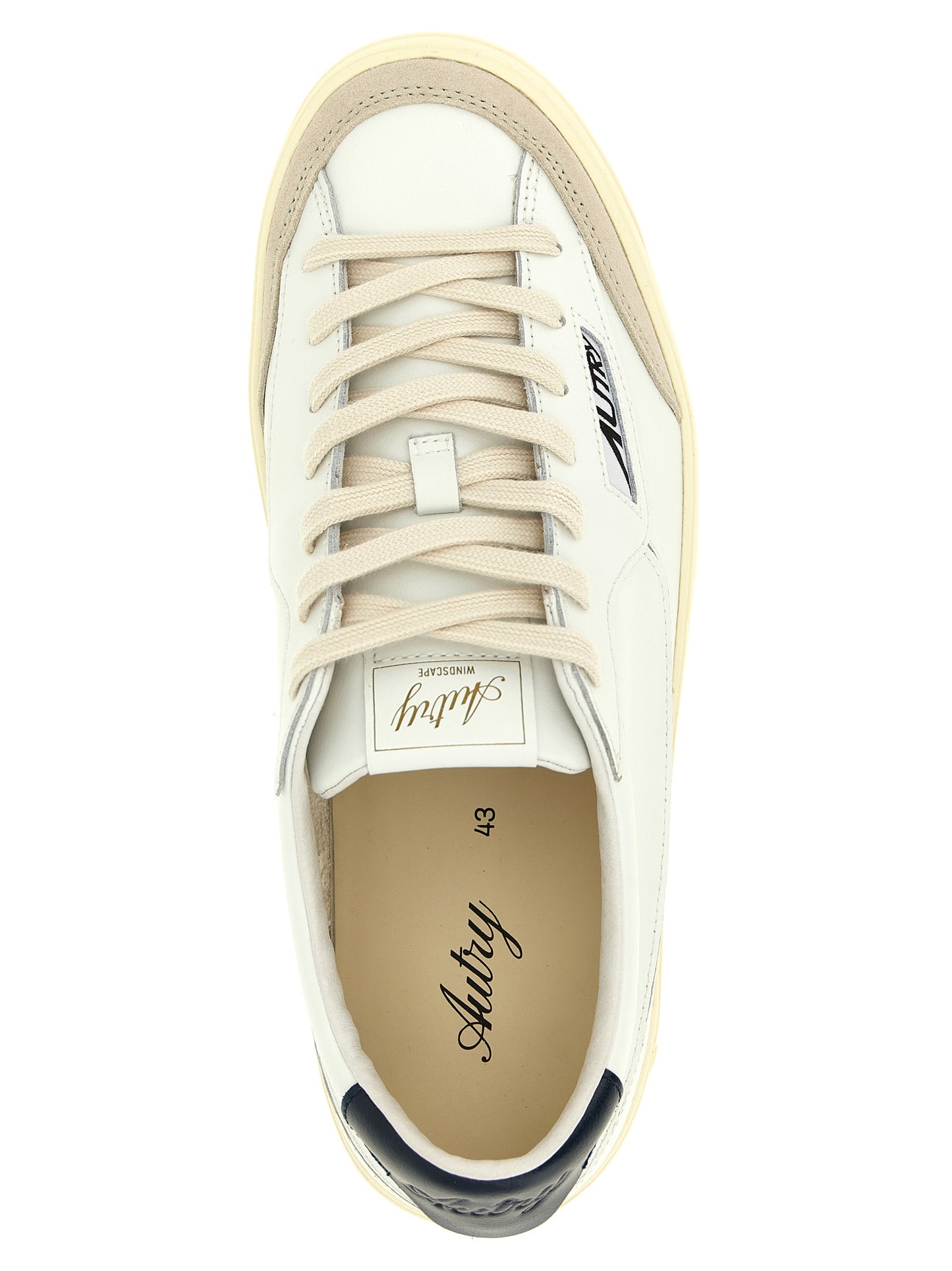Autry White Cowhide Low Top Sneakers Curated Luxury Accessories by Orvyn