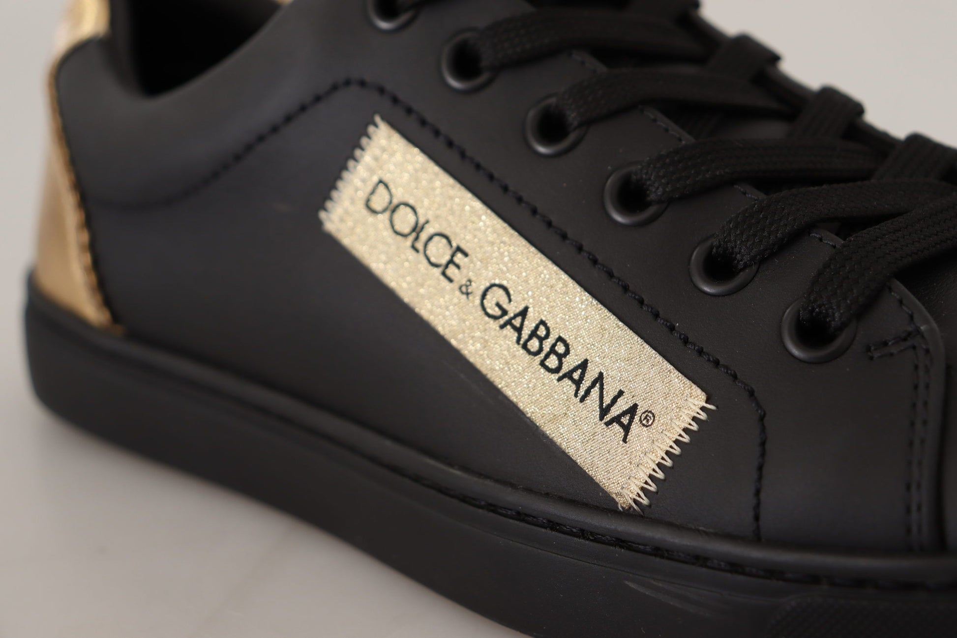 Dolce & Gabbana Black Gold Leather Low Top Sneakers Womens Shoes Curated Luxury Accessories by Orvyn