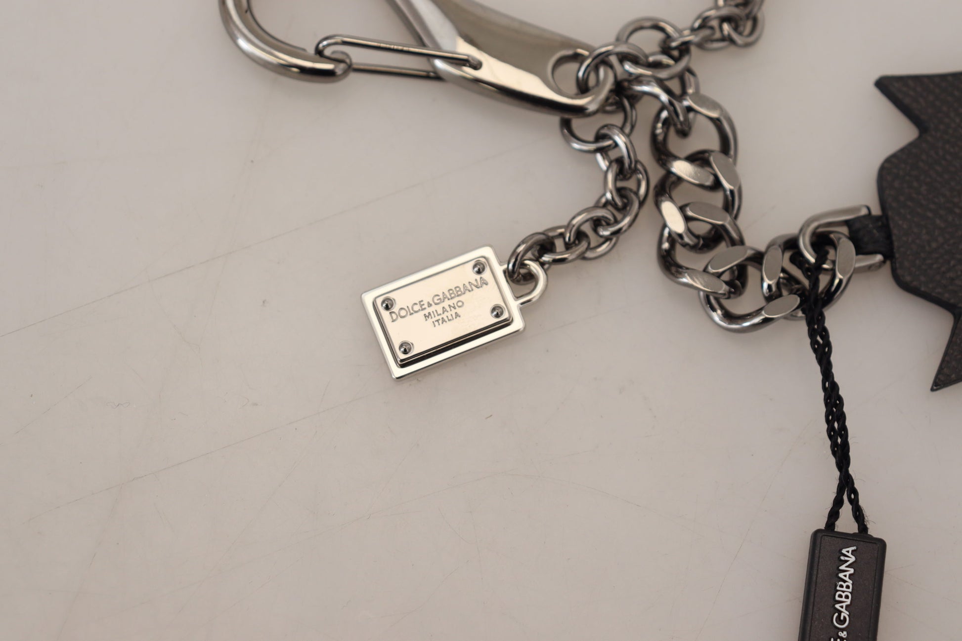 Dolce & Gabbana Black Prince Studs Logo Silver Brass Keychain Curated Luxury Accessories by Orvyn
