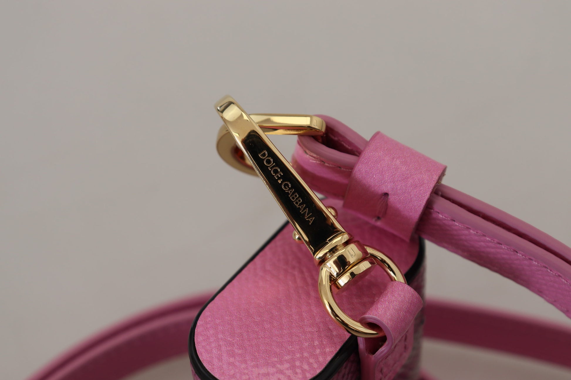 Dolce & Gabbana Pink Black Leather Strap Gold Metal Logo Airpods Case Curated Luxury Accessories by Orvyn