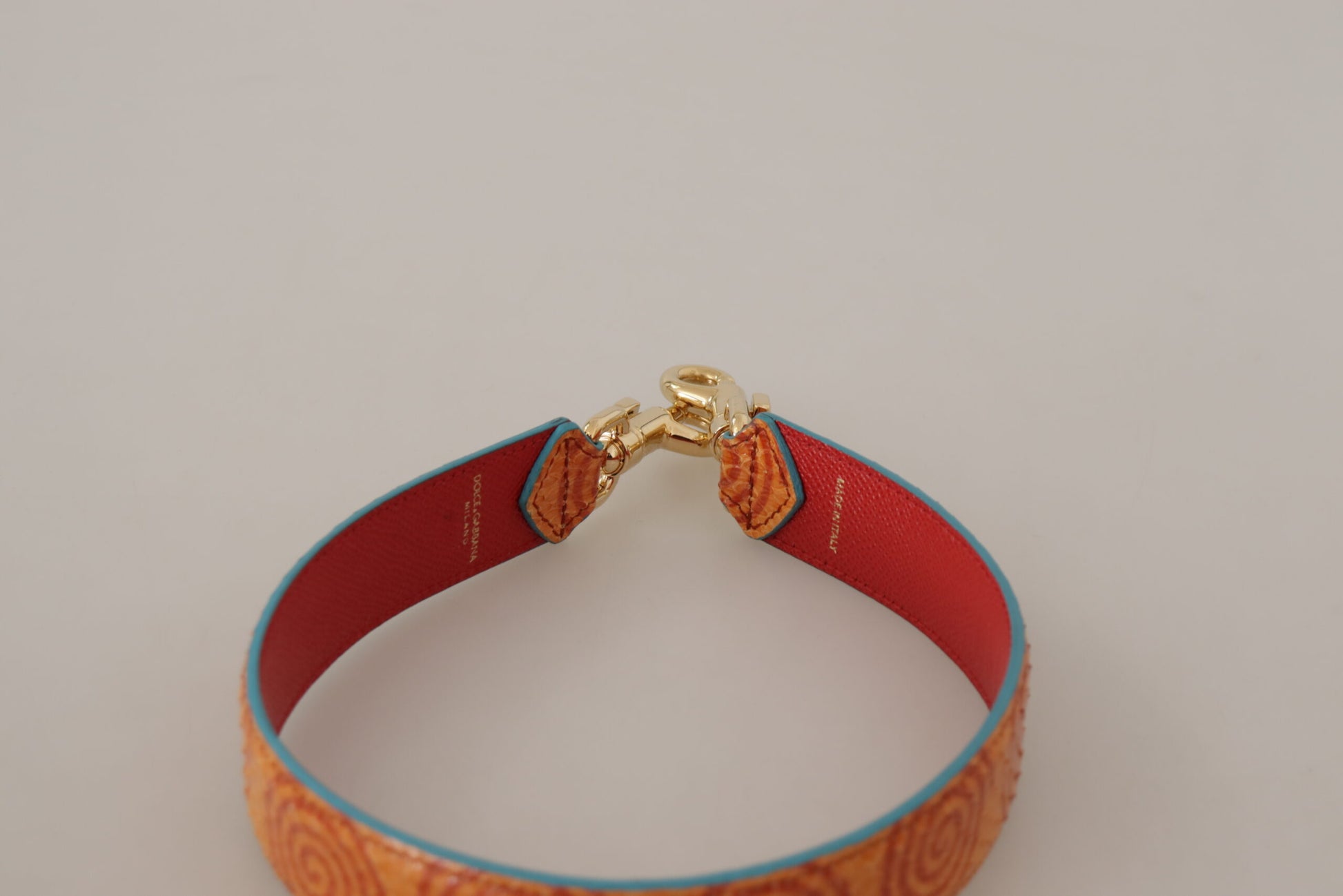 Dolce & Gabbana Orange Leather Swirl Print Bag Shoulder Strap Curated Luxury Accessories by Orvyn