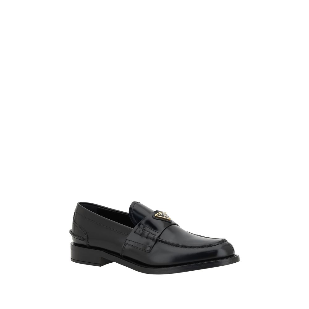 Prada Black Leather Logo Loafers Curated Luxury Accessories by Orvyn