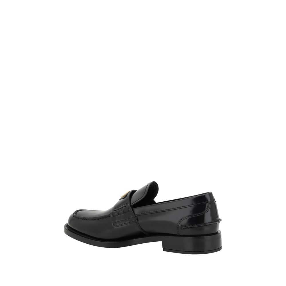 Prada Black Leather Logo Loafers Curated Luxury Accessories by Orvyn