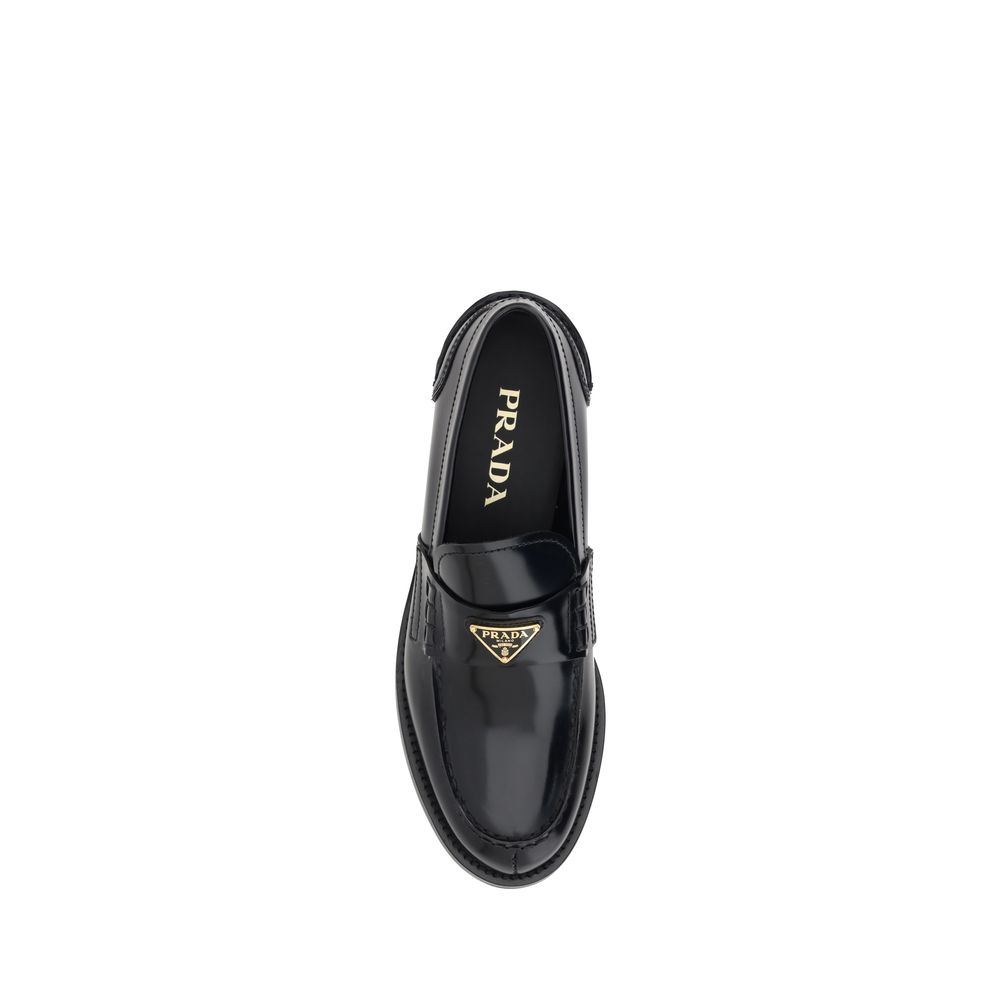 Prada Black Leather Logo Loafers Curated Luxury Accessories by Orvyn
