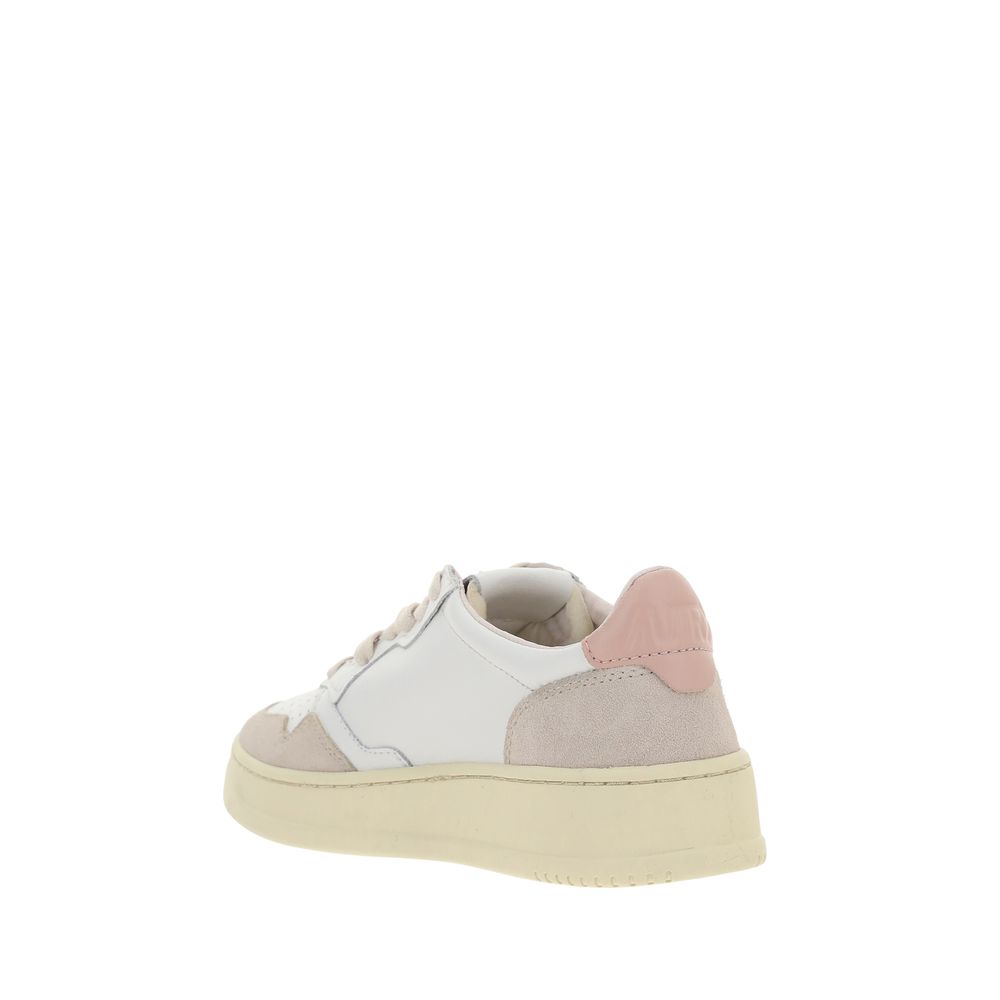 Autry White Leather Low Top Sneakers Curated Luxury Accessories by Orvyn