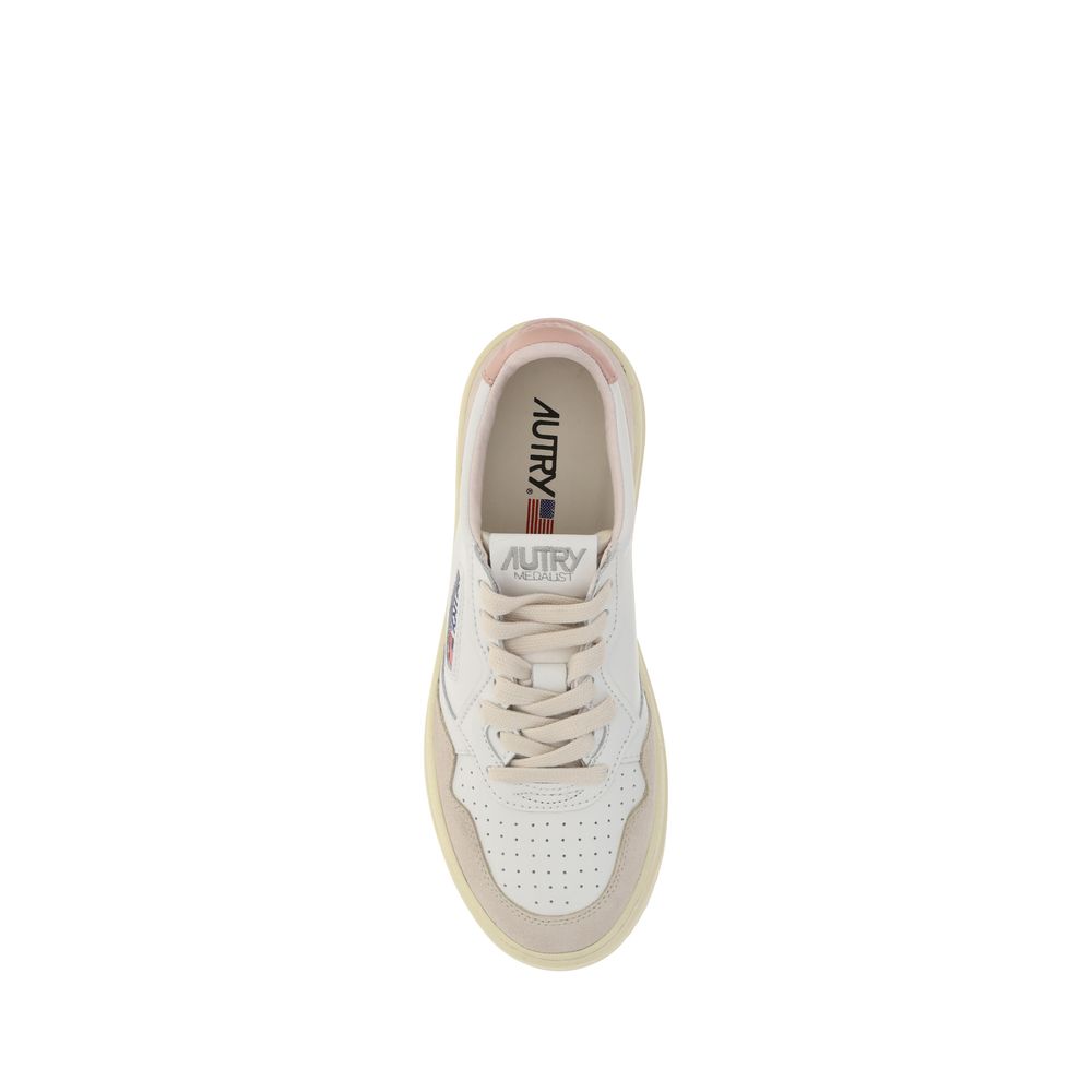 Autry White Leather Low Top Sneakers Curated Luxury Accessories by Orvyn