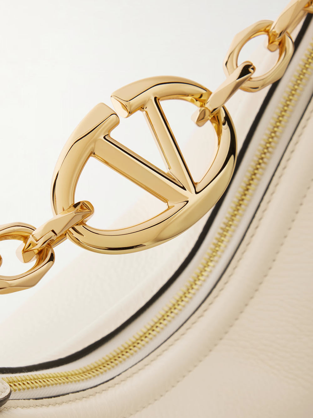 Valentino Garavani Small VLogo Moon Hobo Bag Curated Luxury Accessories by Orvyn