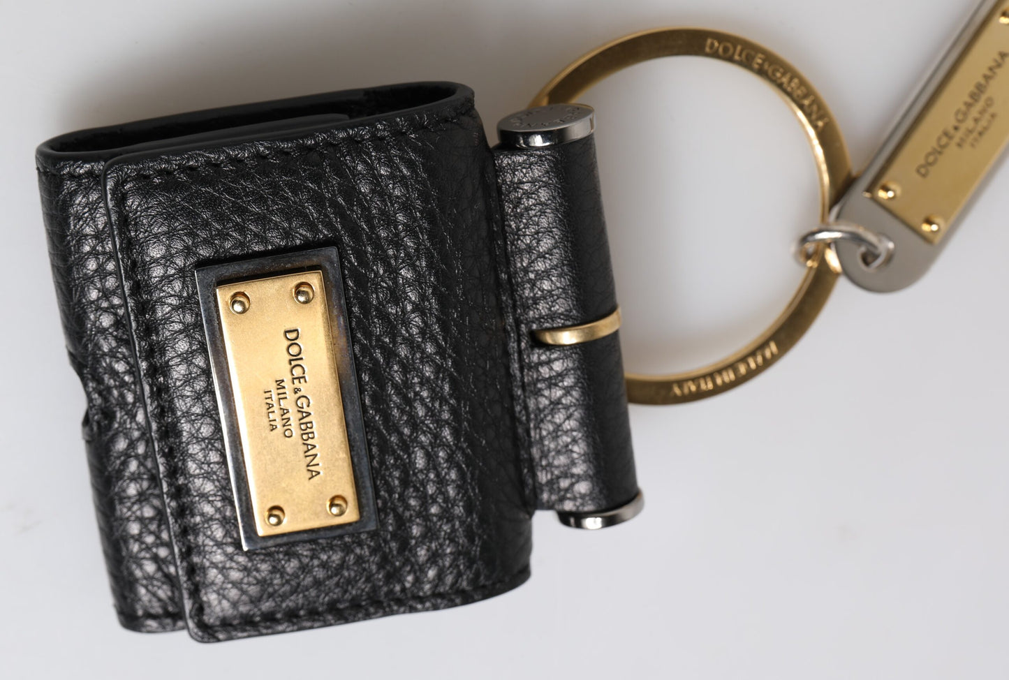 Dolce & Gabbana Black Leather Strap Gold Metal Logo Plaque Airpods Case Curated Luxury Accessories by Orvyn