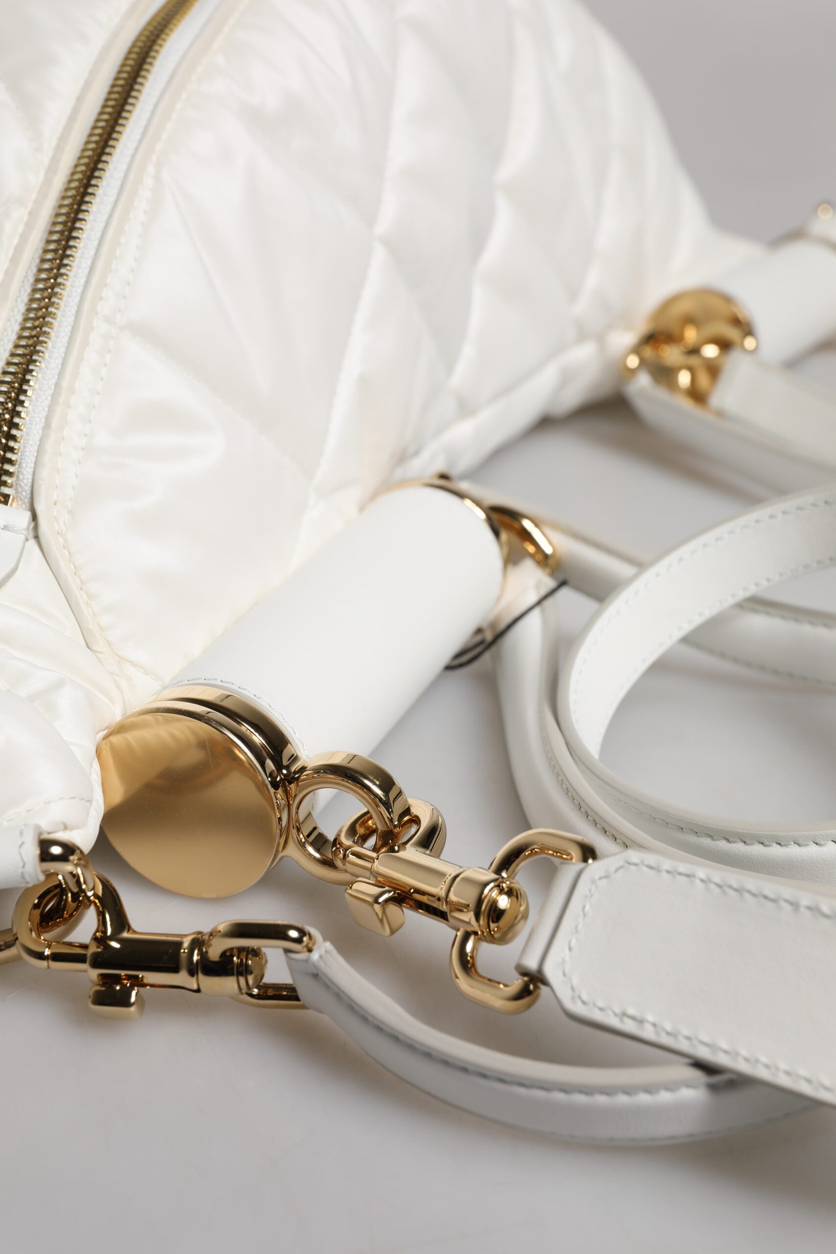 Dolce & Gabbana White Quilted Logo Plaque Belt Waist Fanny Pack Bag Curated Luxury Accessories by Orvyn