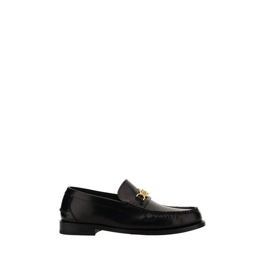 Versace Black Calf Leather Bos Taurus Slip-On Loafers Curated Luxury Accessories by Orvyn