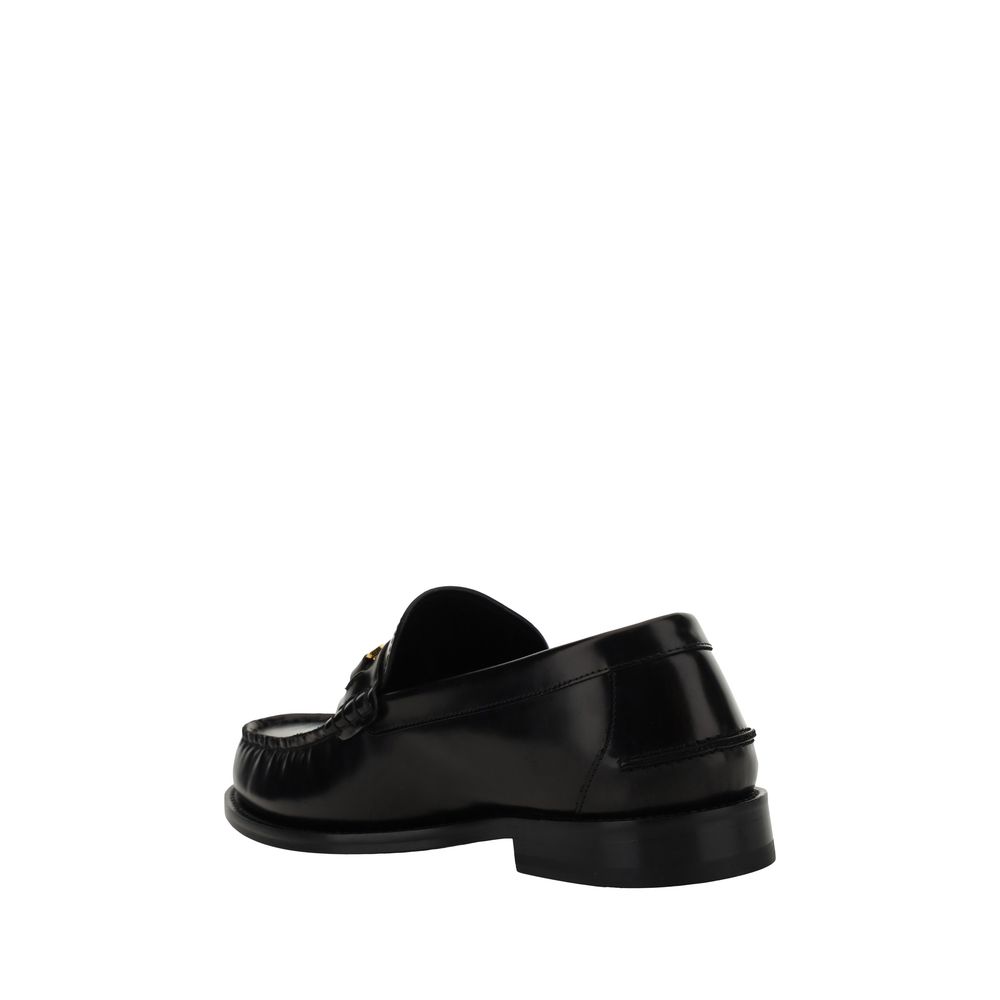 Versace Black Calf Leather Bos Taurus Slip-On Loafers Curated Luxury Accessories by Orvyn