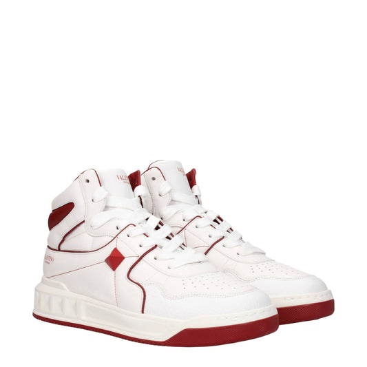 Valentino Garavani White Leather High Top Sneakers Curated Luxury Accessories by Orvyn