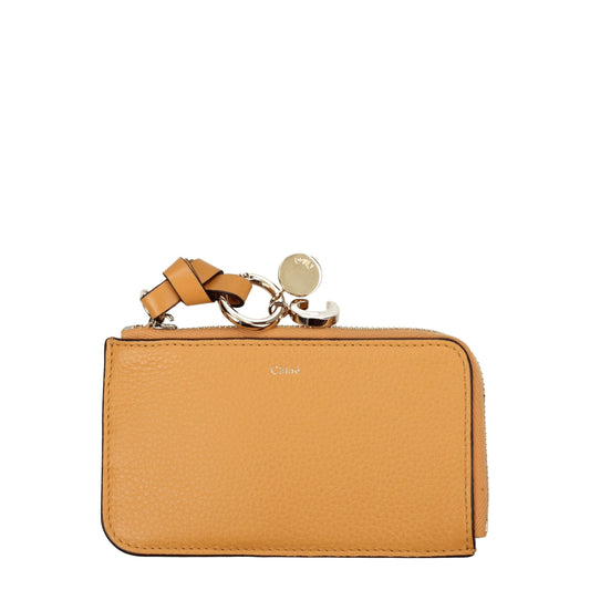 Chloé Orange Leather Wallet Curated Luxury Accessories by Orvyn