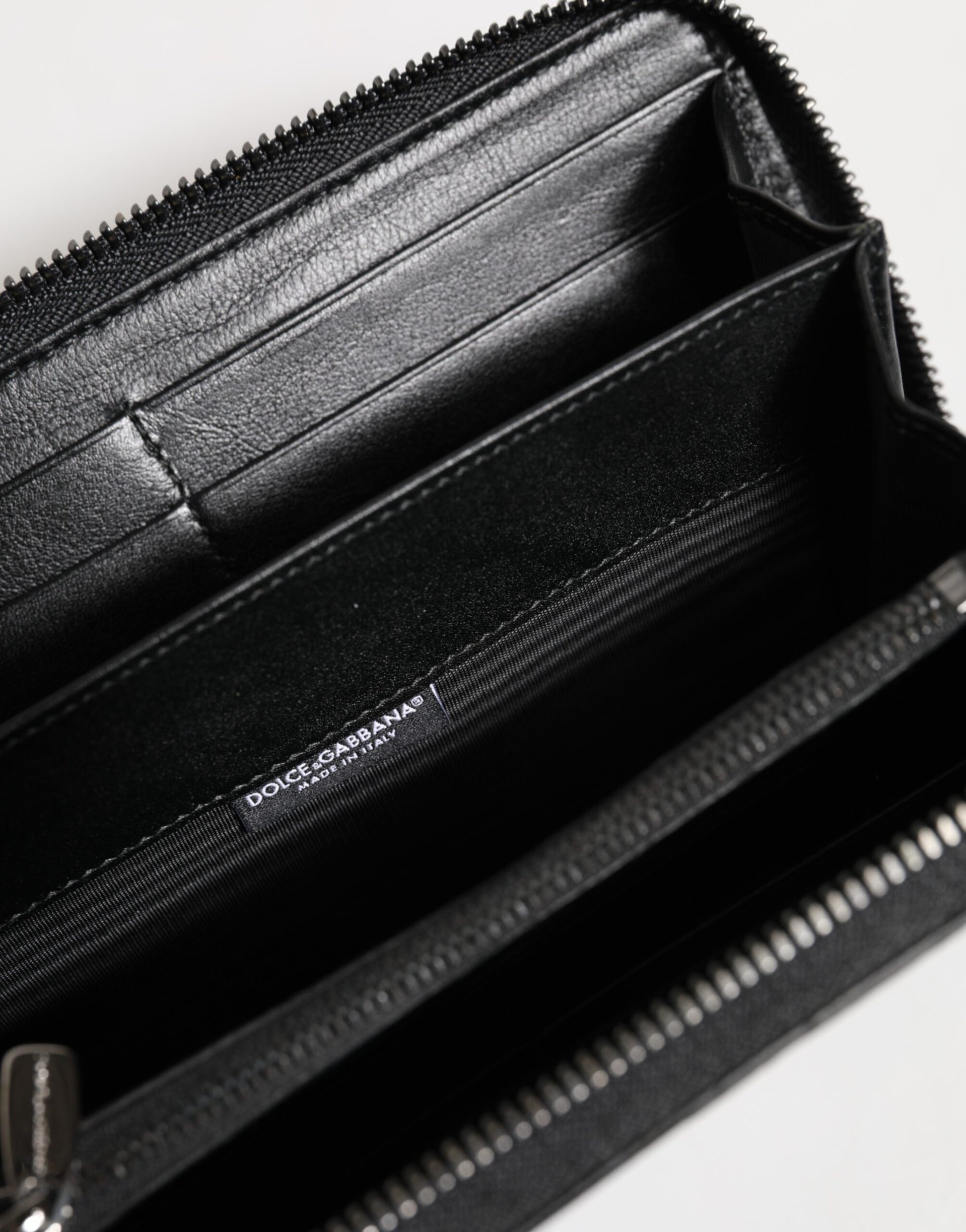 Dolce & Gabbana Black Leather Logo Plaque Zip Around Continental Wallet Curated Luxury Accessories by Orvyn