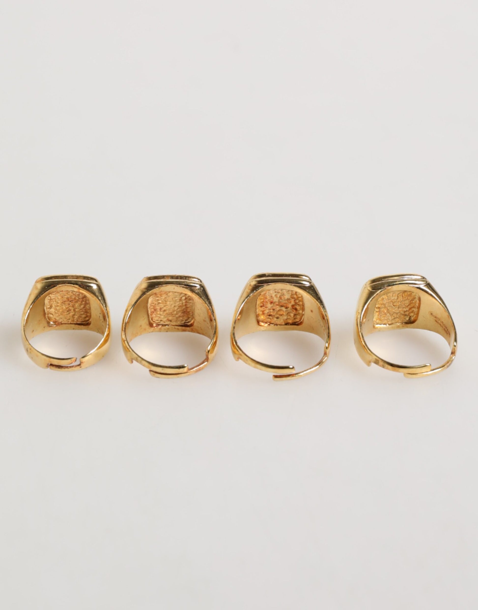 Dolce & Gabbana Gold Tone Brass JAZZ Letter Set 4 Pieces Adjustable Ring Curated Luxury Accessories by Orvyn
