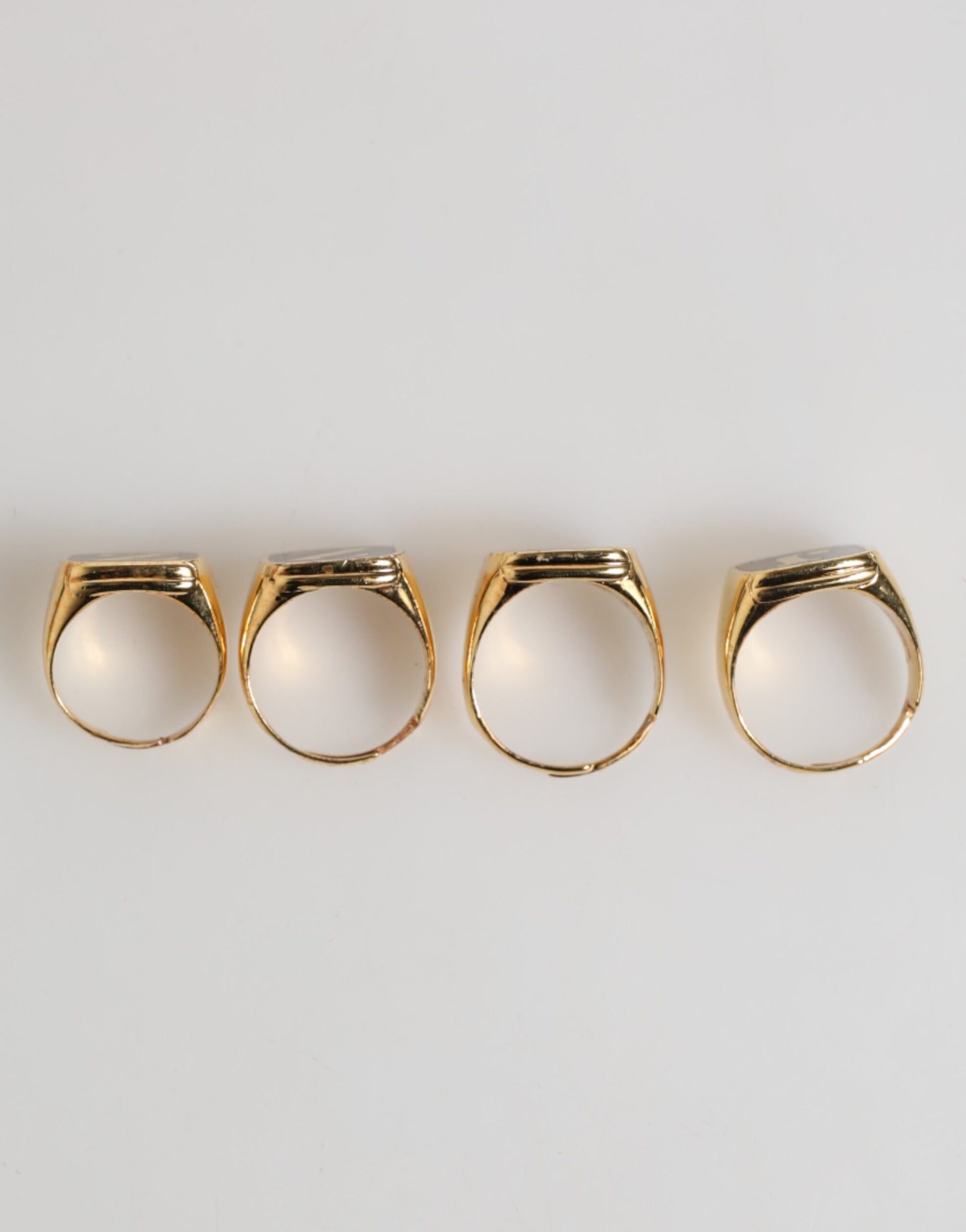 Dolce & Gabbana Gold Tone Brass JAZZ Letter Set 4 Pieces Adjustable Ring Curated Luxury Accessories by Orvyn