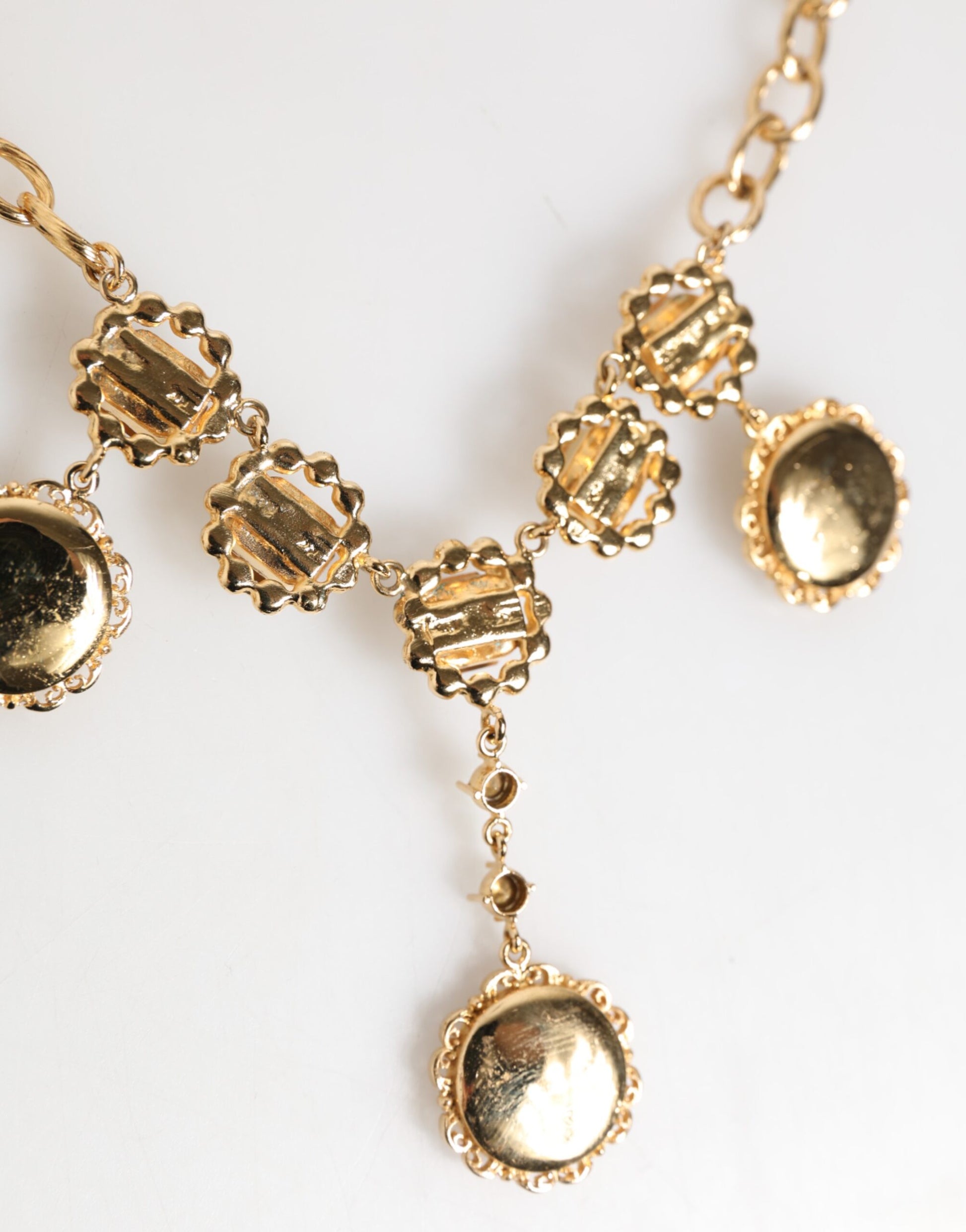 Dolce & Gabbana Gold Crystal Clock Pendant Statement Jewelry Necklace Curated Luxury Accessories by Orvyn