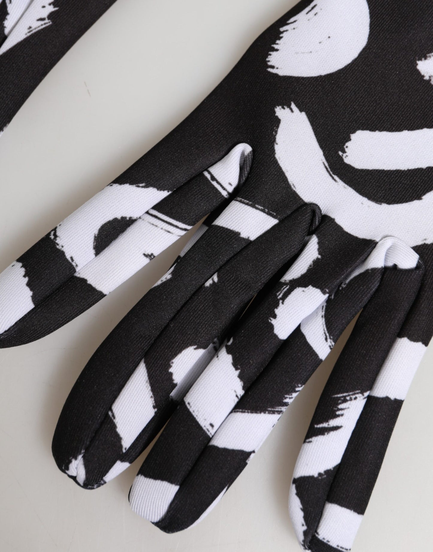 Dolce & Gabbana Black White DG Logo Elbow Length Mitten Gloves Curated Luxury Accessories by Orvyn