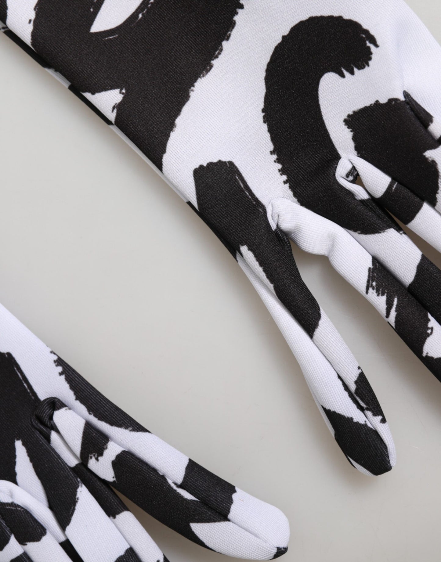 Dolce & Gabbana Black White DG Logo Elbow Length Mitten Gloves Curated Luxury Accessories by Orvyn