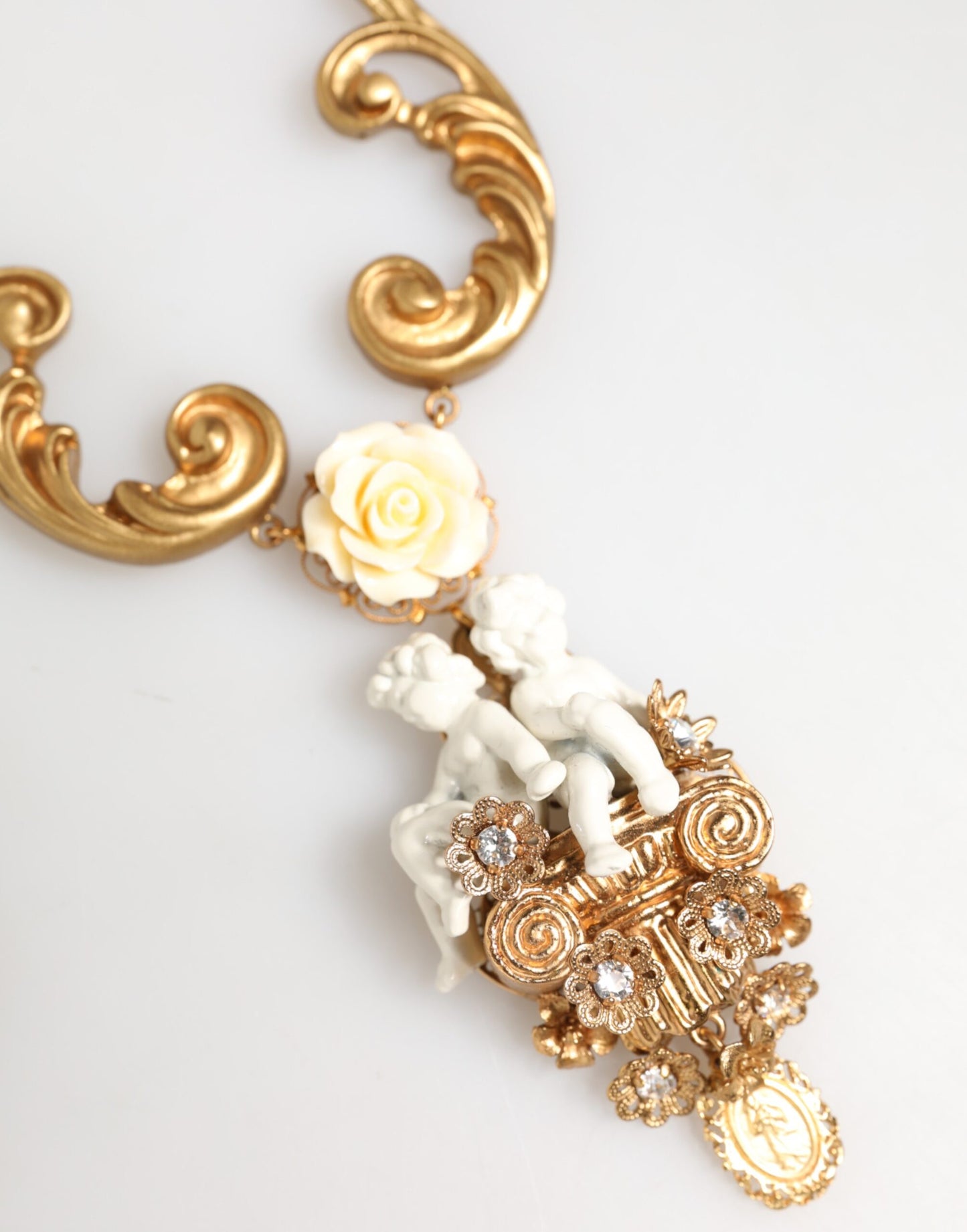 Dolce & Gabbana Gold Ceramic Crystal Cherub Baroque Pendant Necklace Curated Luxury Accessories by Orvyn