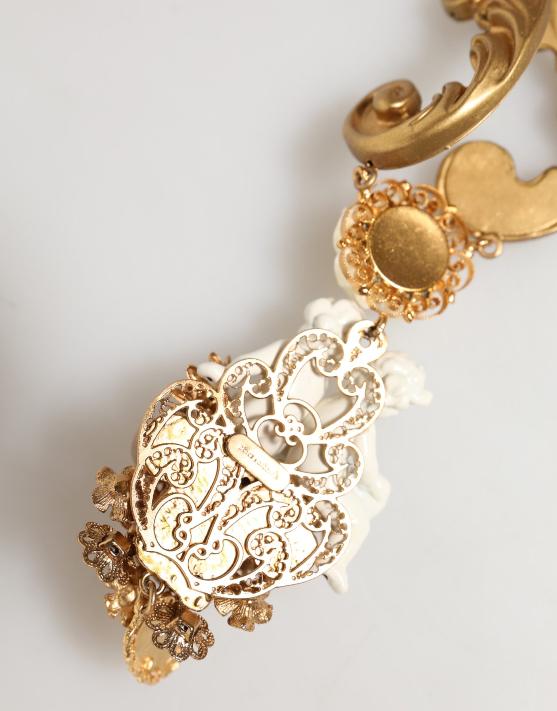 Dolce & Gabbana Gold Ceramic Crystal Cherub Baroque Pendant Necklace Curated Luxury Accessories by Orvyn